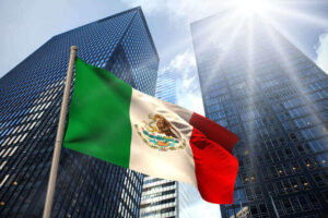 Photo of flag and buildings for business in Mexico