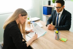 A business negotiation scene with executives reviewing a contract.